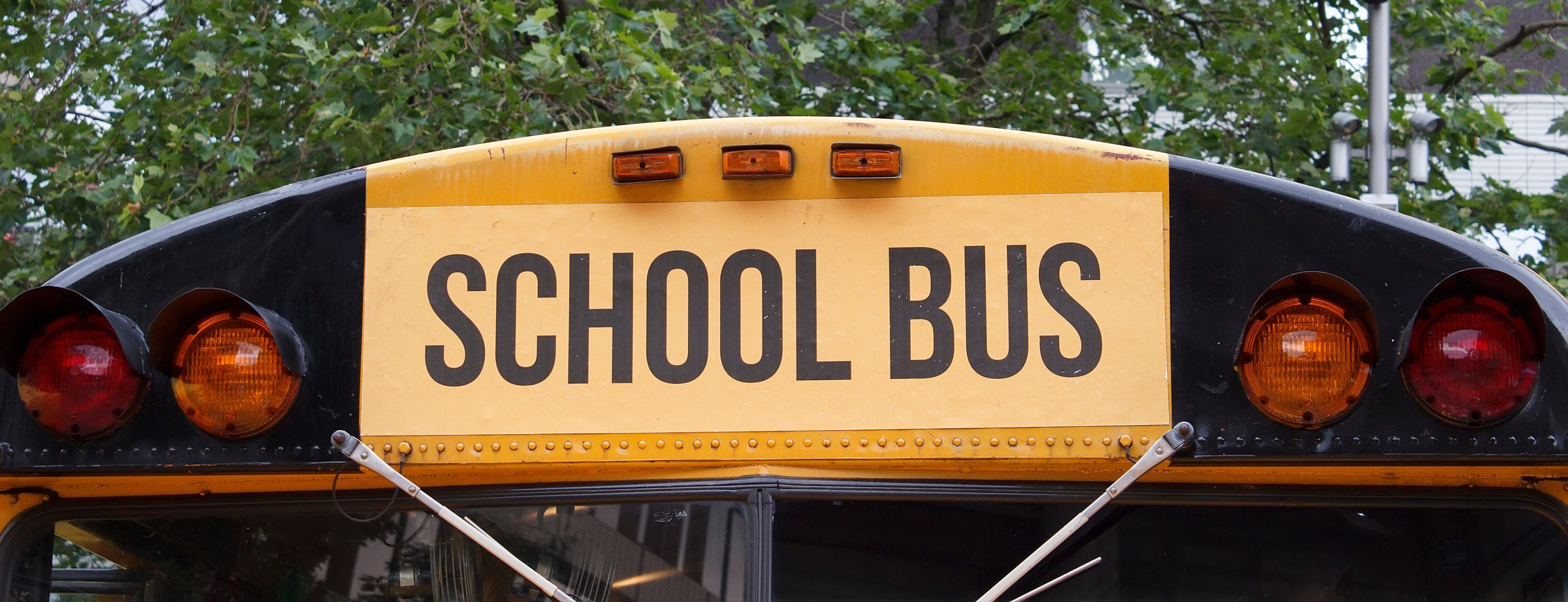 Retro School Bus close up, visible sign
